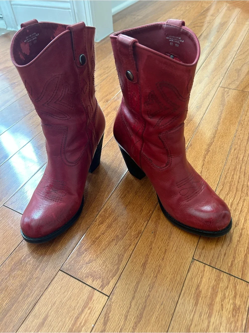 Red Women's Leather Cowboy Boots ankle boots. Leather uppers, man made lining.